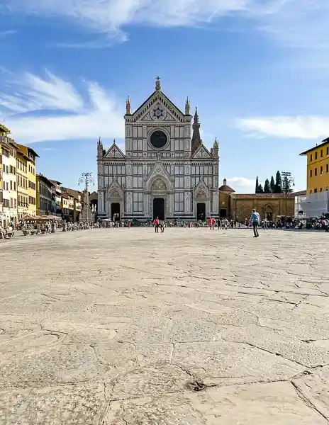 View of the Basilica of Santa Croce in Piazza Santa Croce, Florence, Italy, on a sunny day.