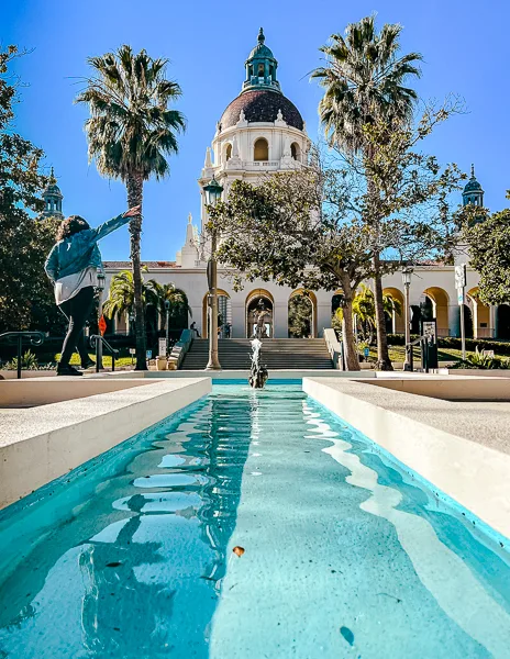 pool of water leading to the view of pasadena city hall