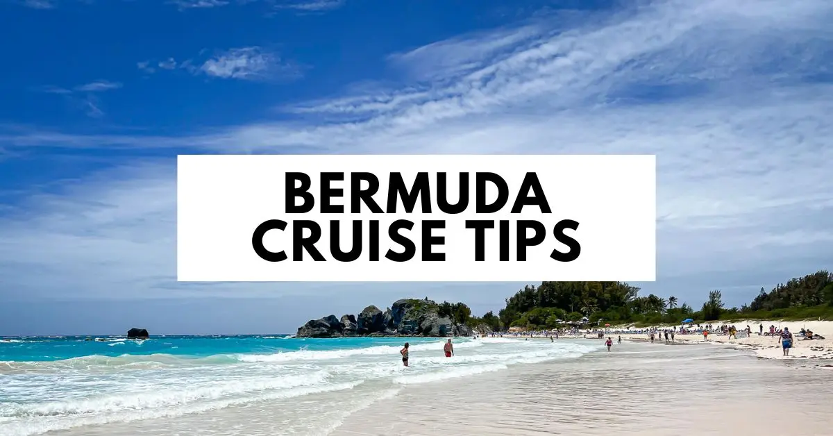 featured blog image | Scenic view of a beach in Bermuda with turquoise waters, pink sand, and people enjoying the shore under a clear blue sky. The text 'Bermuda Cruise Tips' is prominently displayed in the center of the image.