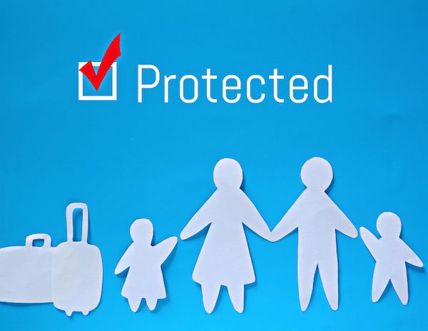 paper cut outs of a family with luggage with the word protected at the top and a box checkarmed in red