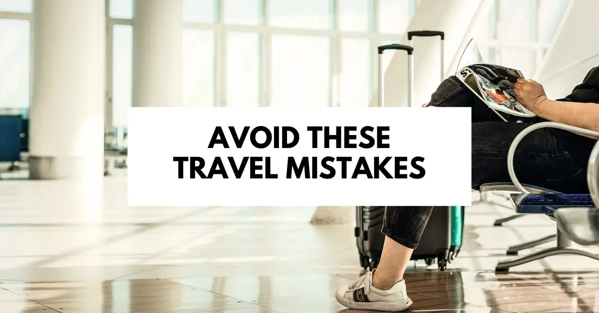 featured blog image of a traveler sitting at an airport with luggage, reading a magazine. The text "AVOID THESE TRAVEL MISTAKES" is prominently displayed in bold across the image.