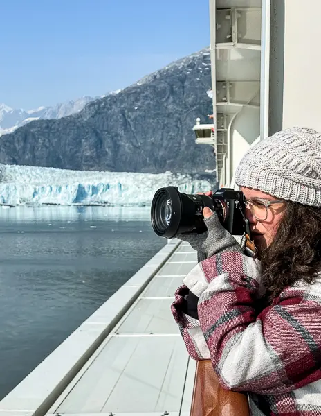 kathy taking pictures cruising glacier bay