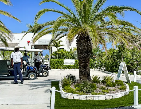 Golf carts and staff outside the reception area at Silver Cove.