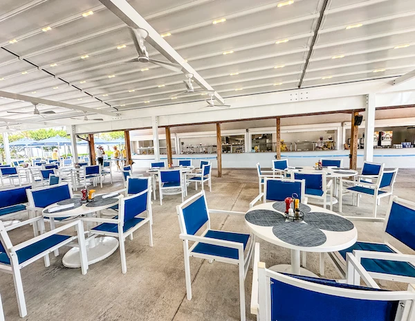 Outdoor seating area at the Silver Cove buffet with blue and white furniture