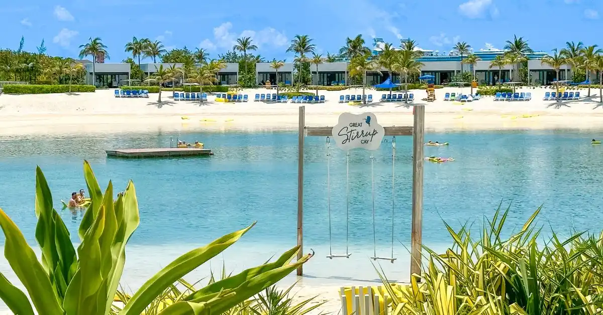 Lagoon with swings and beachfront villas in the background at Silver Cove in Great Stirrup Cay, Bahamas