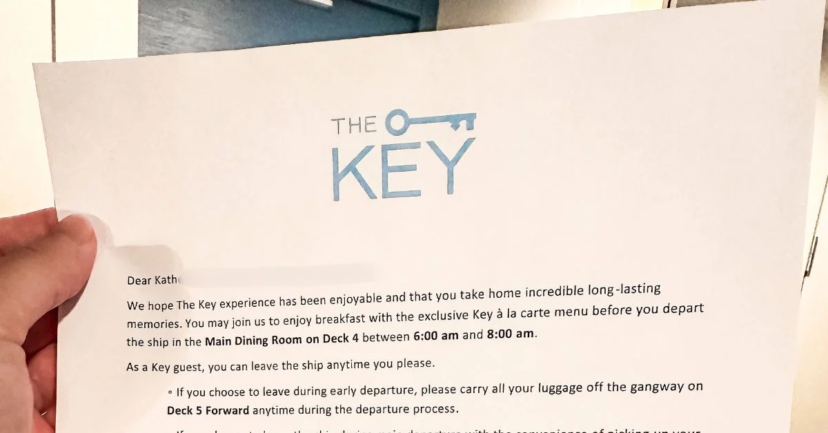 Photo of a letter addressed to a guest about Royal Caribbean's The Key program, highlighting the exclusive breakfast and priority disembarkation instructions.