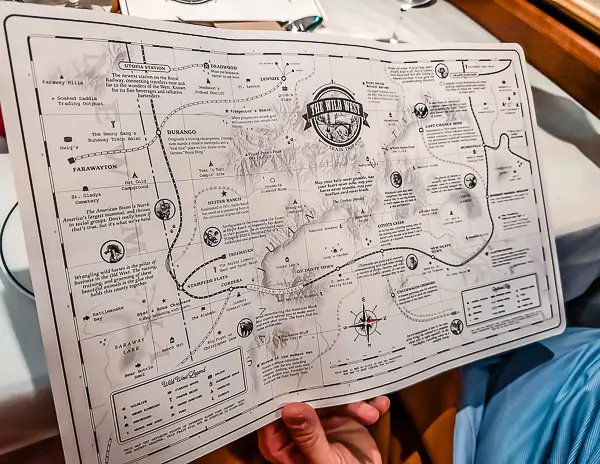 A detailed map of the Wild West from the Royal Railway experience, showcasing the fictional train route, landmarks, and themed elements of the immersive dinner show.